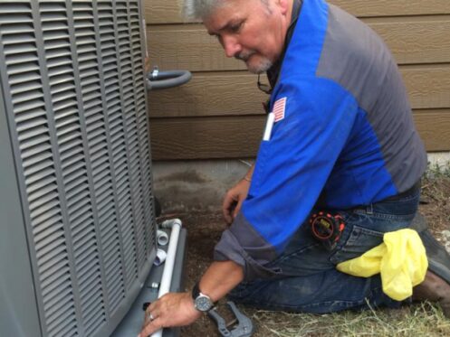 Trusted HVAC Technician Working on Heat Pump in Austin, TX